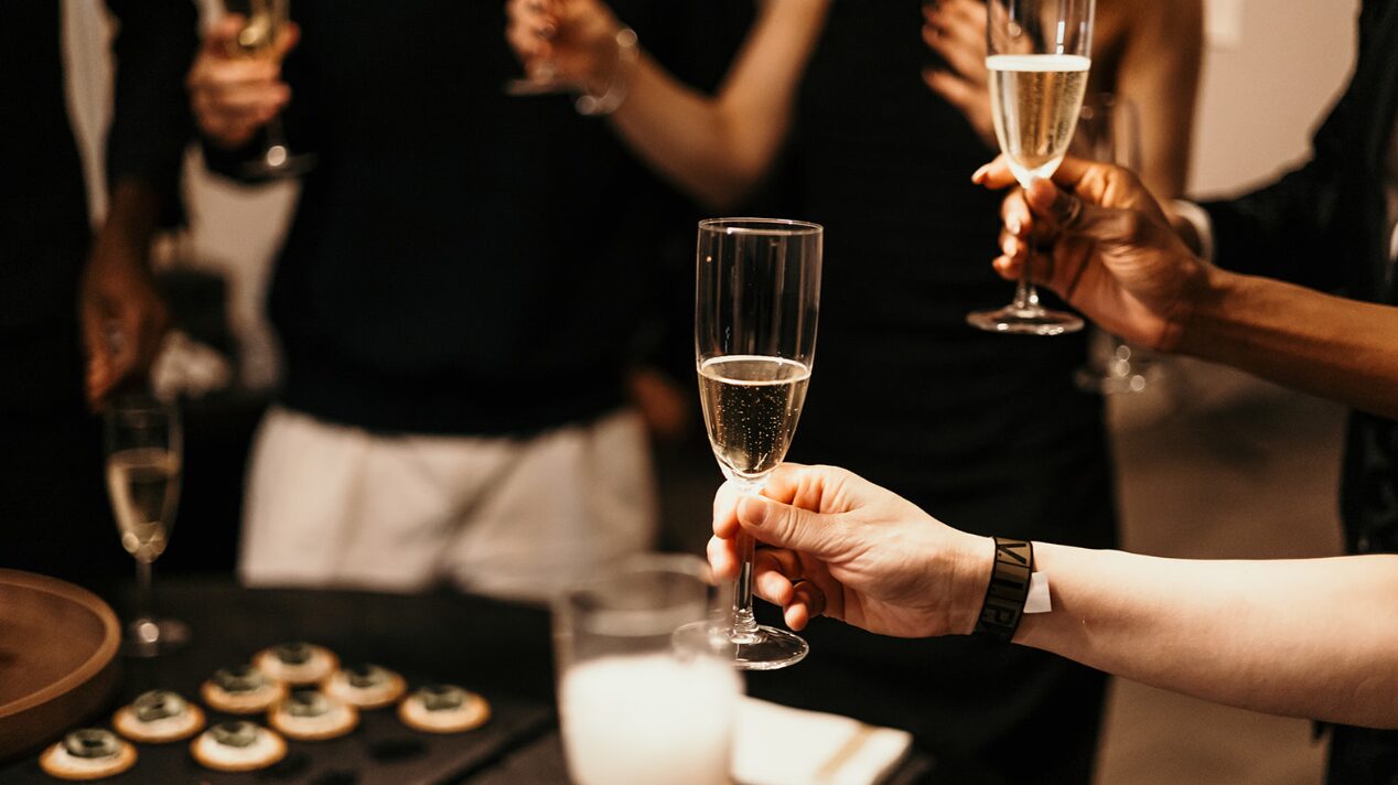 Champagne toast at a Supercar Martini Circle gathering