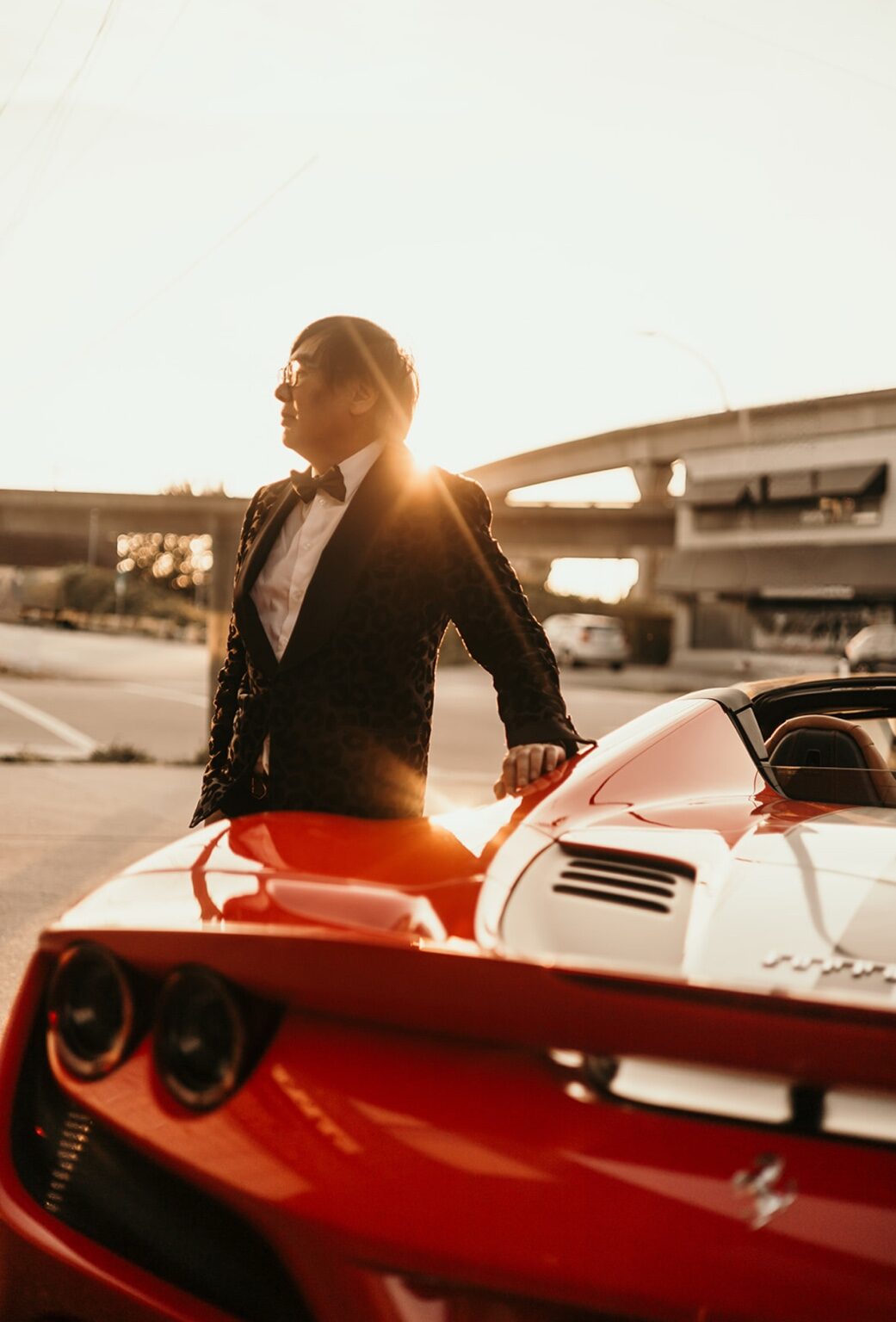 Supercar Martini Circle member beside a red Ferrari